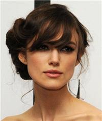 A choppy fringe and elegant upstyle.