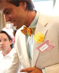 Attire. groom, boutonnière, bow tie